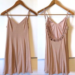 Cute rose gold dress with cute back.